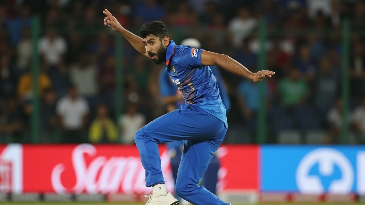 Indian fast bowler in whites running in to deliver at the nets, left arm raised at the crease, focused eyes on the batter, with a physiotherapist standing on the boundary rope watching the landing foot